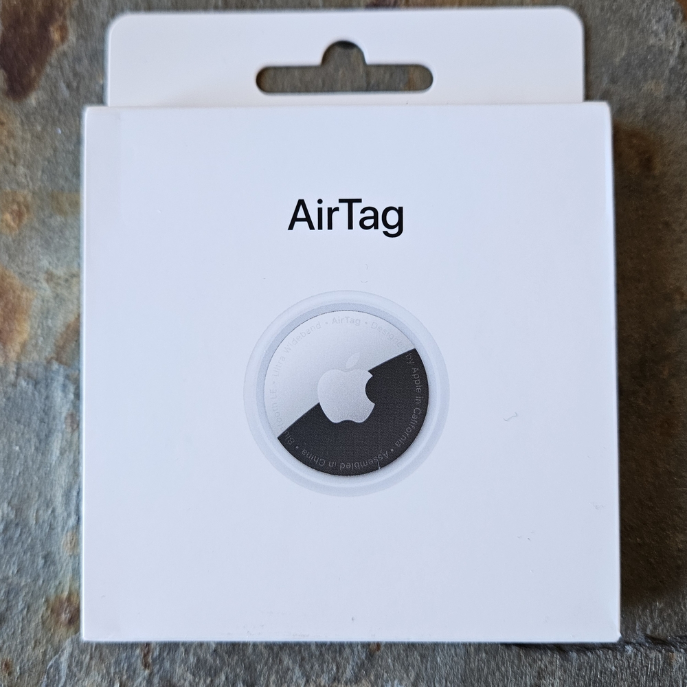 Apple AirTag in Sleek Silver and White